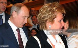 russias president vladimir putin and his wife lyudmila walk before picture id170043337