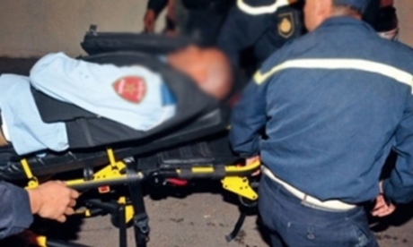 سيارة تدهس شرطيا