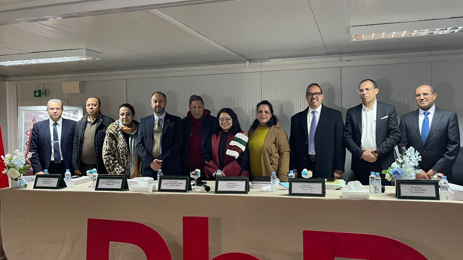 بالصور: المدرسة الوطنية للتجارة والتسيير بمراكش تحتضن مناقشة أطروحة دكتوراه حول الابتكار المفتوح في قطاع السيارات بالمغرب 1 IMG 20251213 WA0073